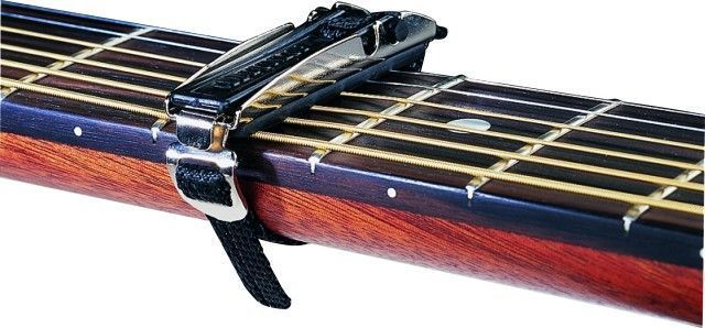 Фото Каподастер для гитары Dunlop Deluxe Curved 15C